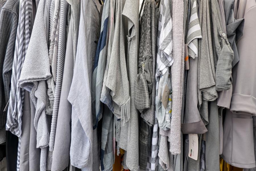 Clean dress shirts arranged on hangers