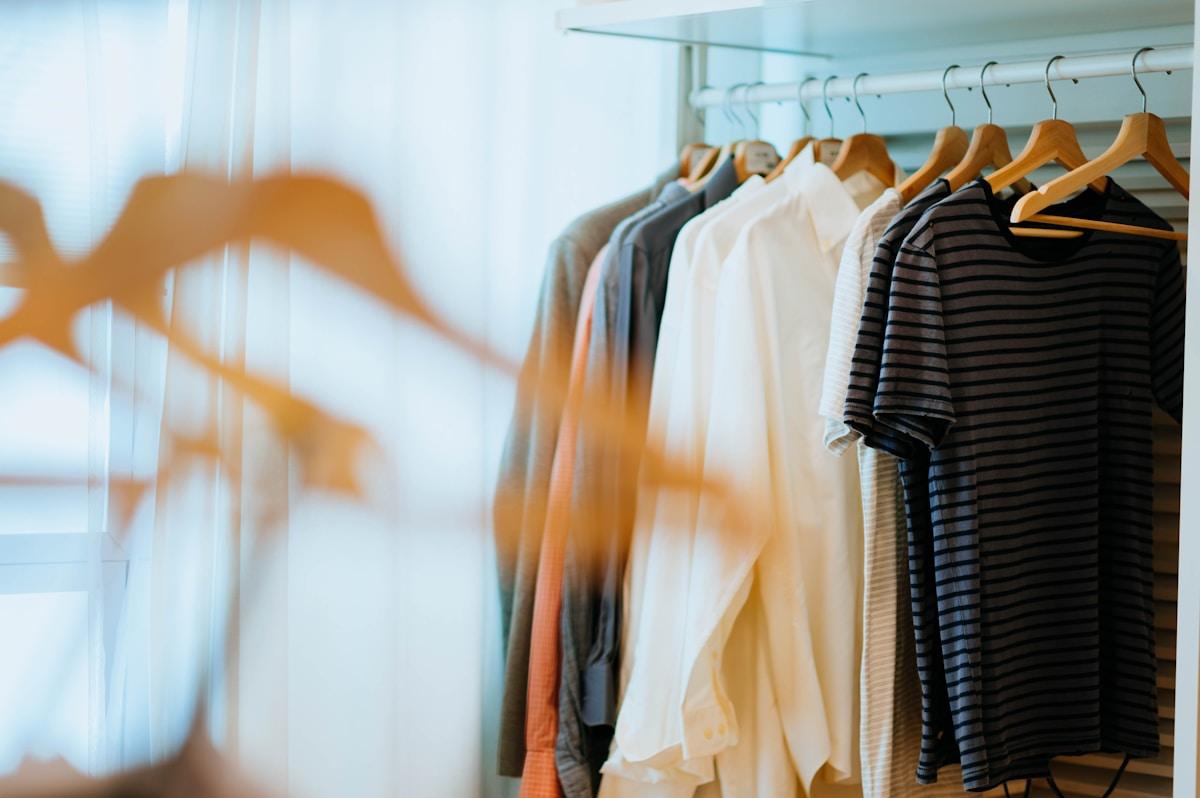 Fresh garments hanging on a rack after cleaning
